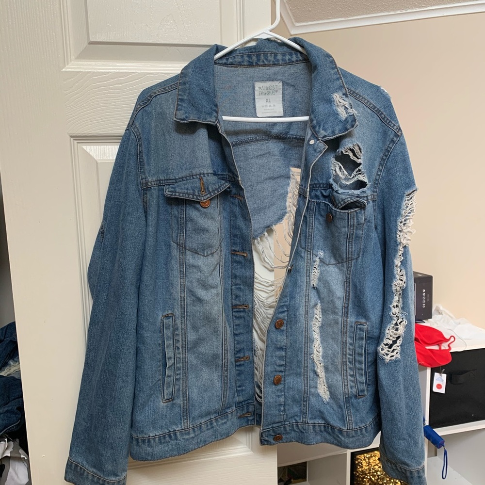 Distressed denim jacket